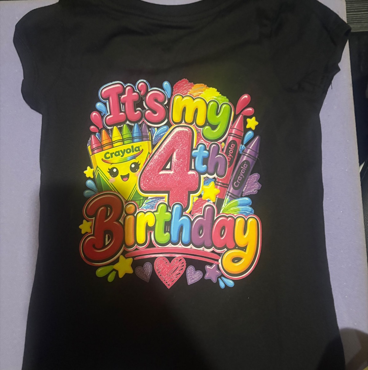 Black youth tee with a colourful crayon birthday print