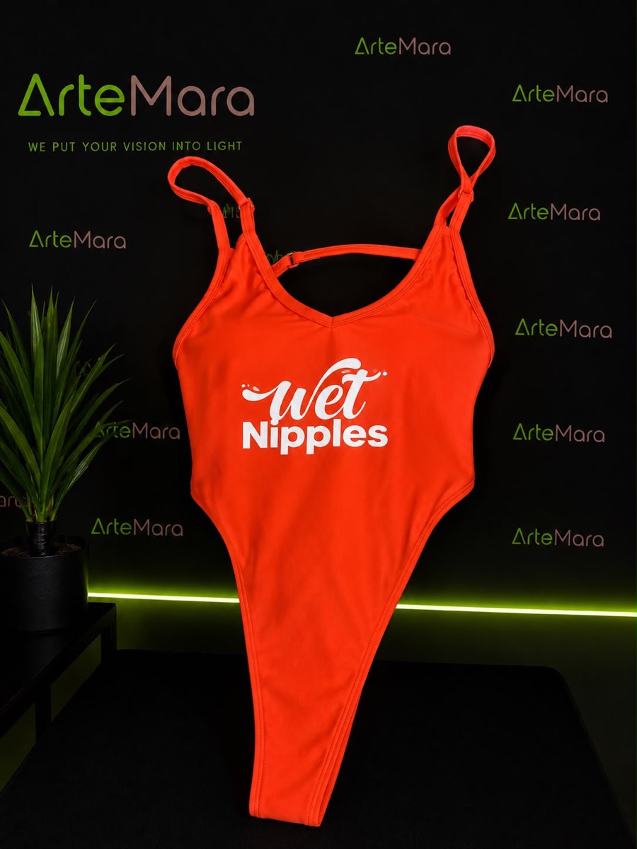 Orange one-piece swimsuit with a custom white script print